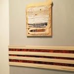 Painting (inside structures), 2021, acrylic, wood, polyesther, 160 x 40 x 6 cm. Above a painting by Henna Aho. Turun Taidehalli, 2022.