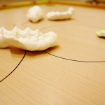 Detail of Tummelplatz (Factors), 2024, clay, wood, ink, acrylic. 